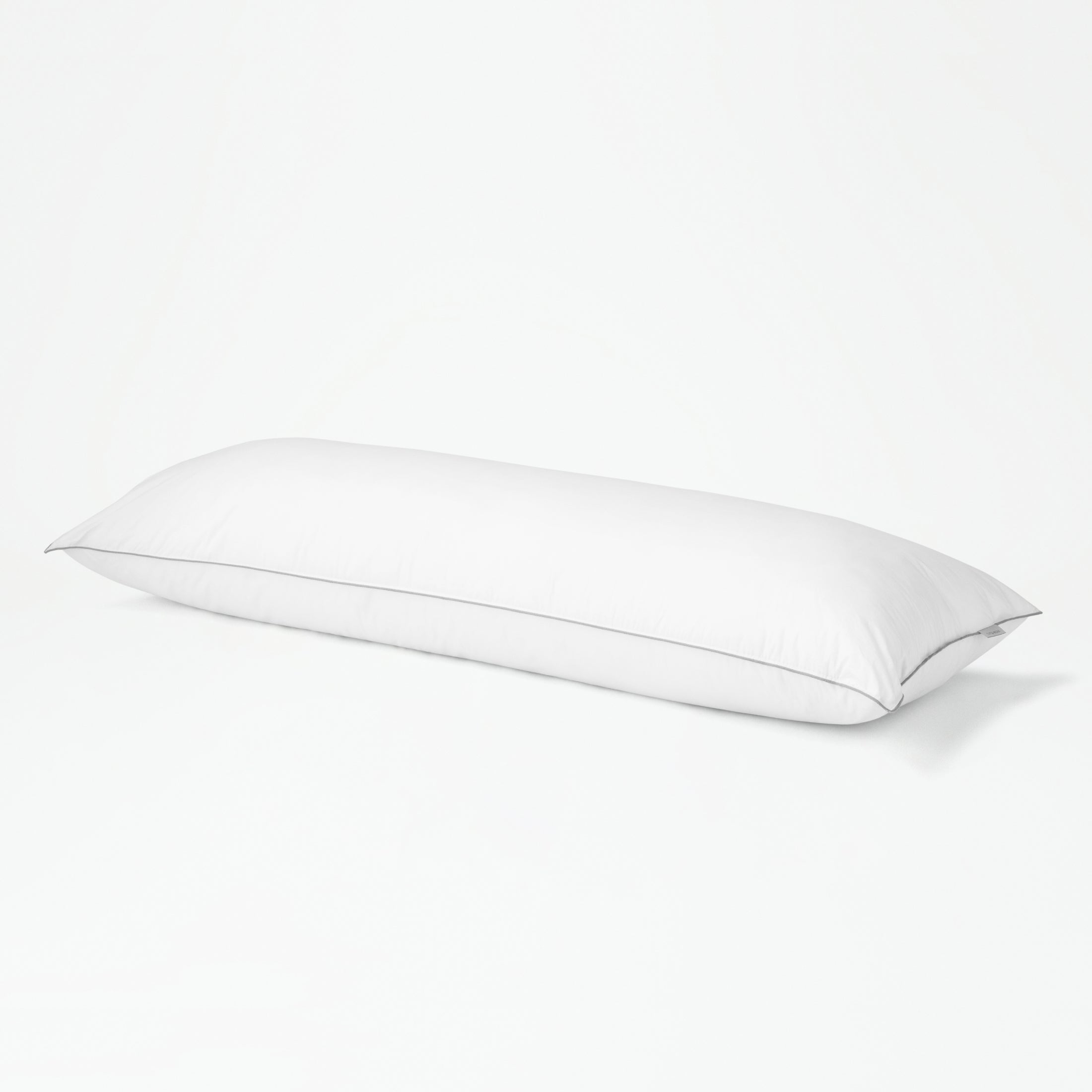 The Tuft and Needle body pillow on a white background