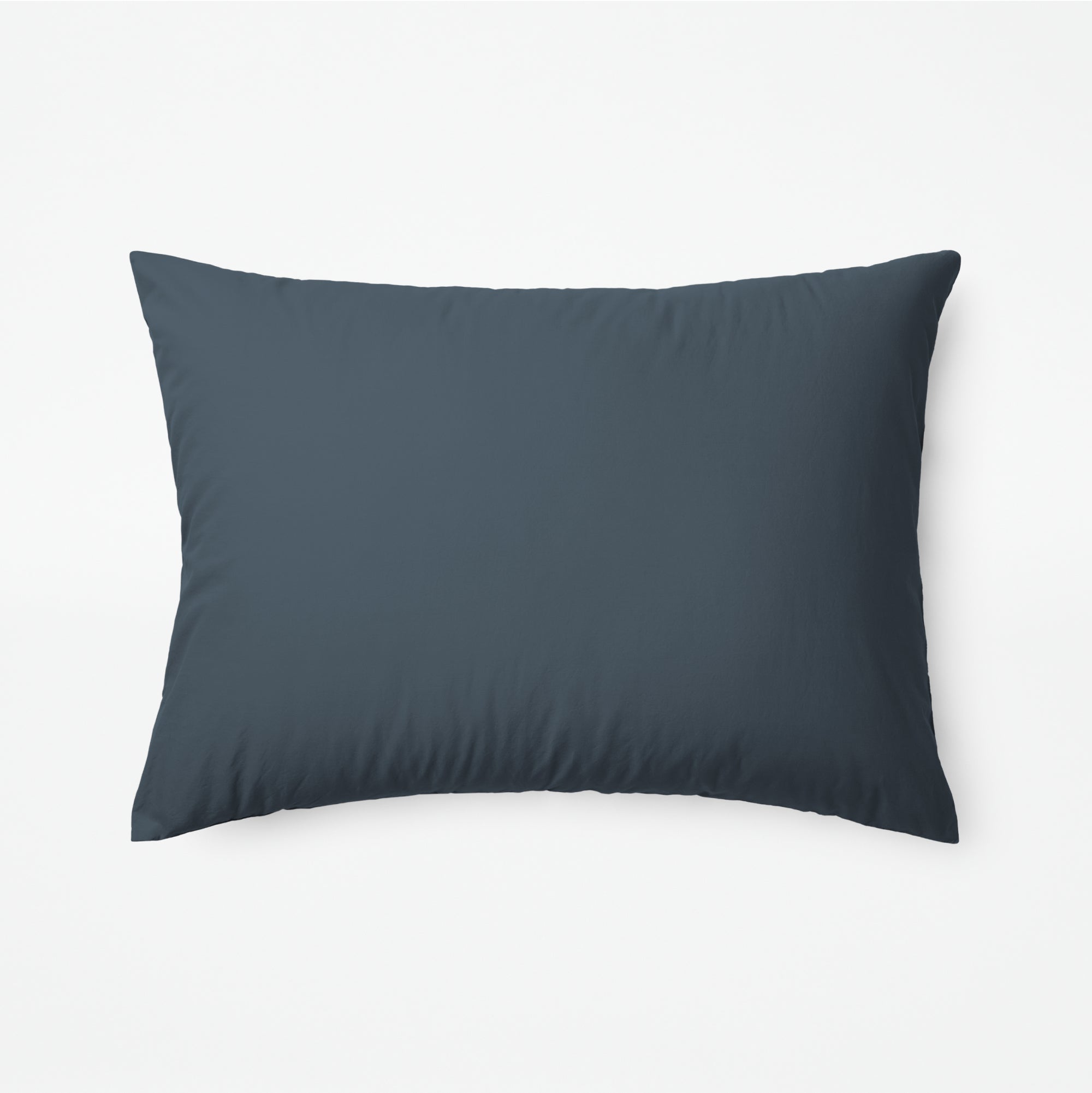 The Tuft and Needle Classic Percale Sheet Set, one pillow laying horizontally || color: Slate
