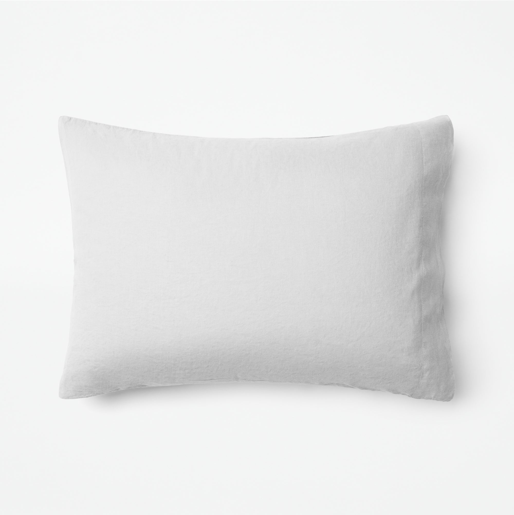 The Tuft and Needle Linen-Cotton Blend Pillowcase Set, 1 pillow in a pillowcase showing in a horizontal position || color: Cloud