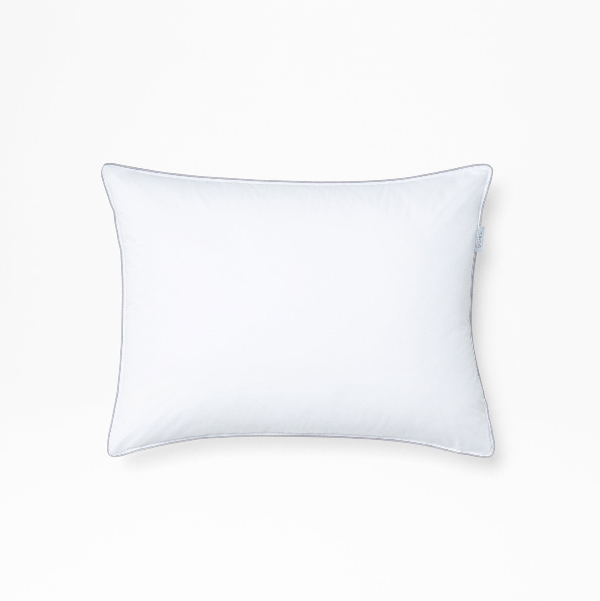 Tuft & Needle White pillow on a light gray background
